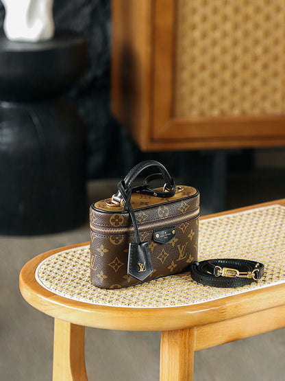 Louis Vuitton Vanity Chain Pouch in monogram coated canvas