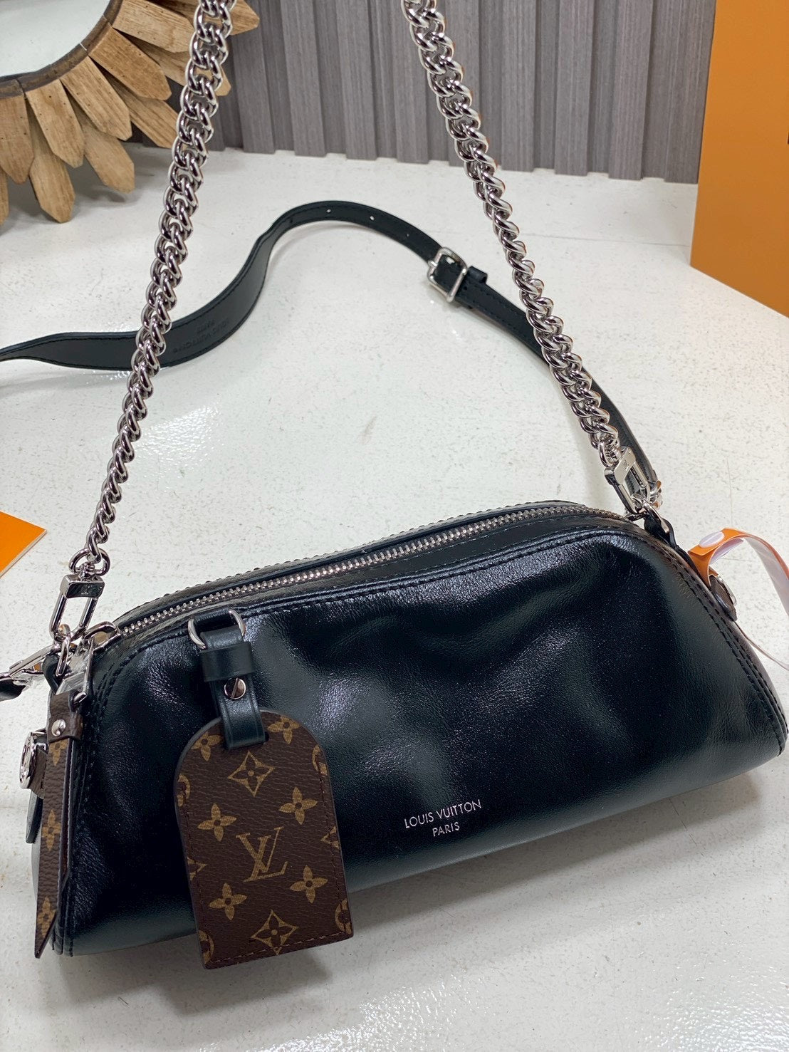 Louis Vuitton Pochette Vibe in black