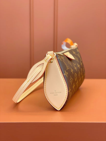 Louis Vuitton Pochette Tirette bag in monogram coated canvas