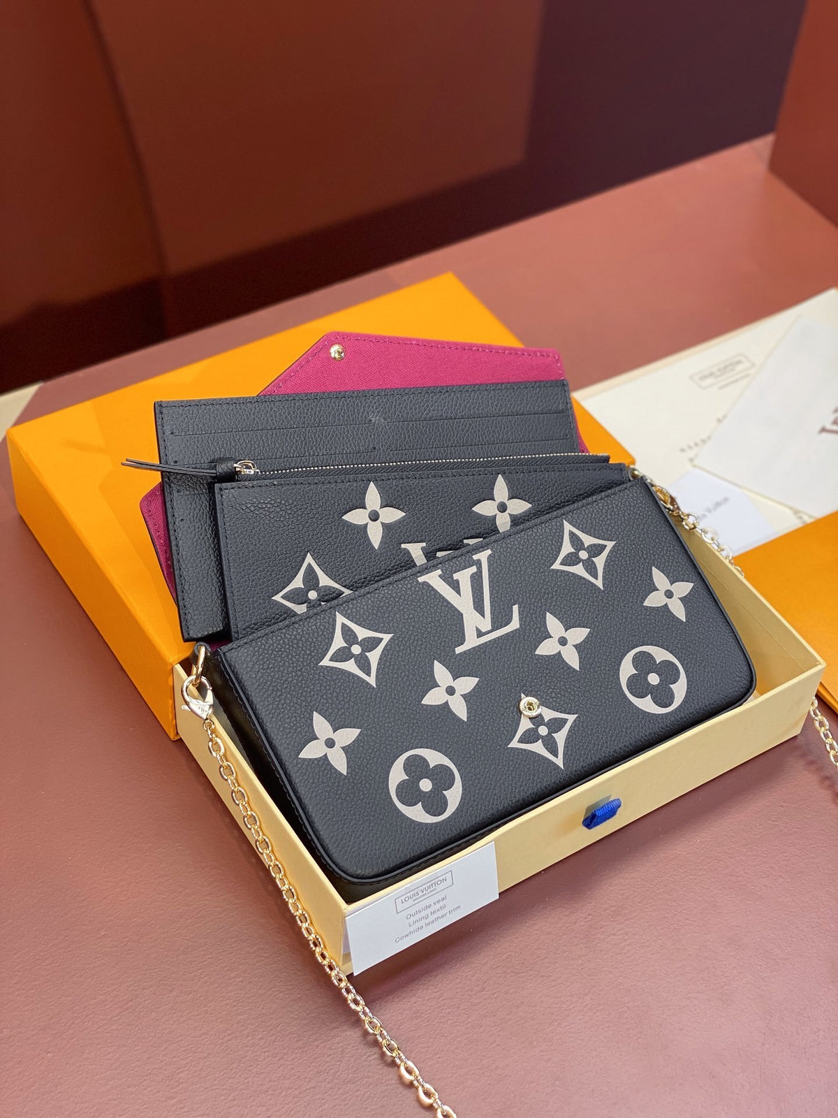 Louis Vuitton Félicie Pochette in black and beige Bicolor