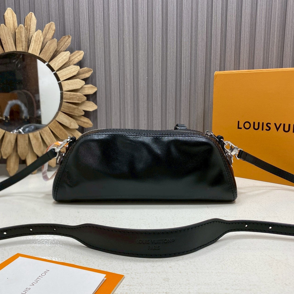 Louis Vuitton Pochette Vibe in black