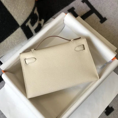 Hermès Kelly Pochette Mini Bag White