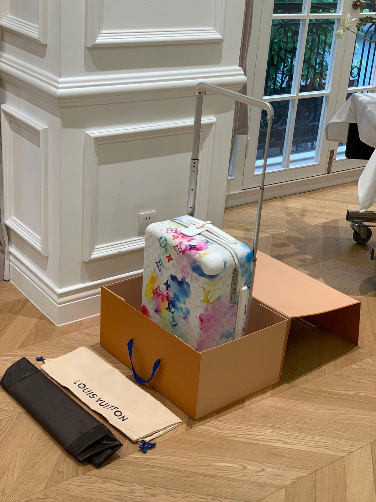 Louis Vuitton Horizon 55 suitcase in the Watercolor Multicolor