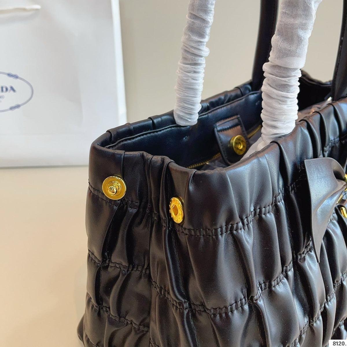 BOW DETAIL RUCHED TOP HANDLE BAG 29 IN BLACK SAFFIANO LEATHER