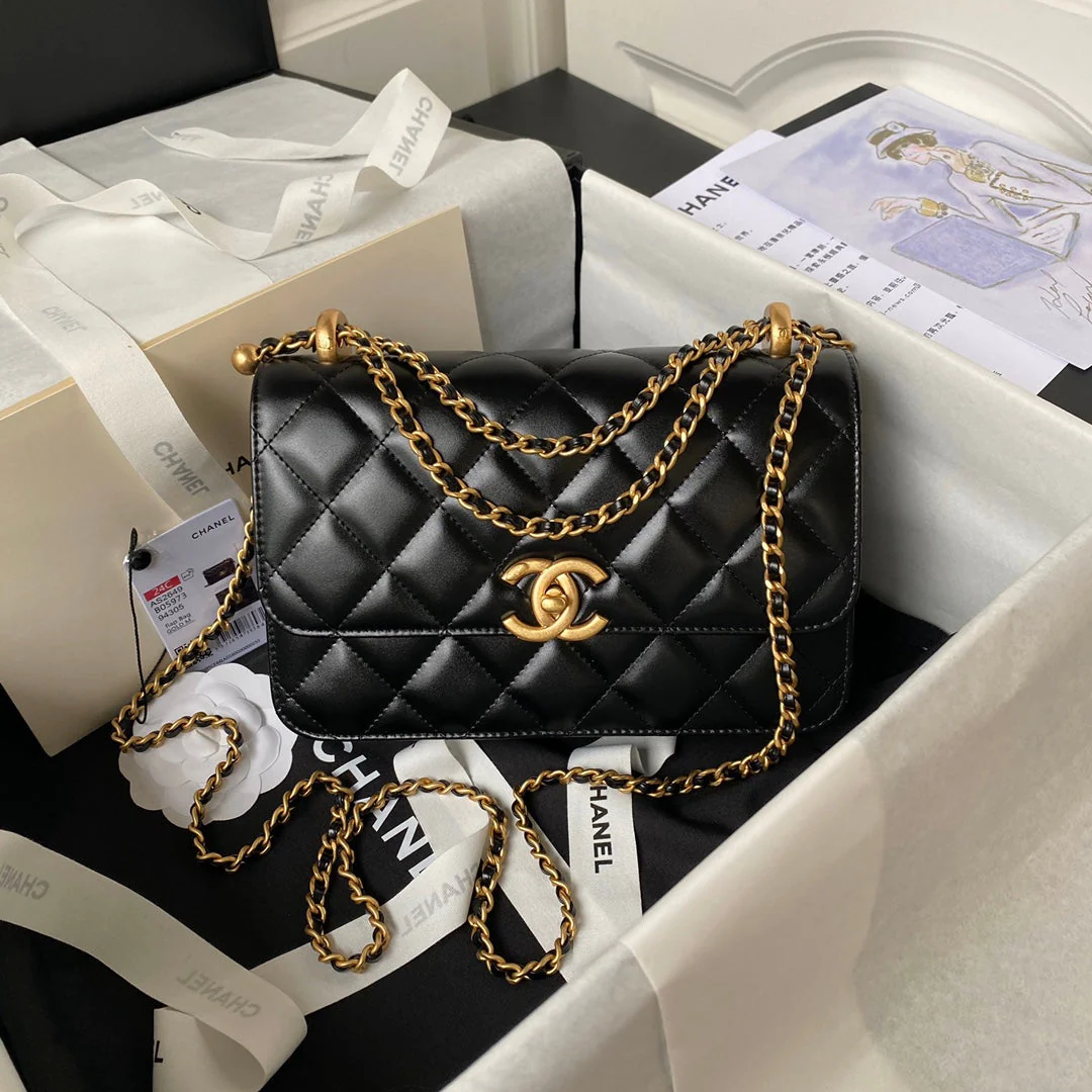 CHANEL FLAP BAG 22 IN BLACK CALFSKIN WITH DOUBLE GOLD BALL