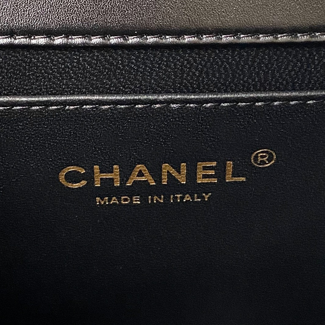 CHANEL FLAP BAG 22 IN BLACK CALFSKIN WITH DOUBLE GOLD BALL
