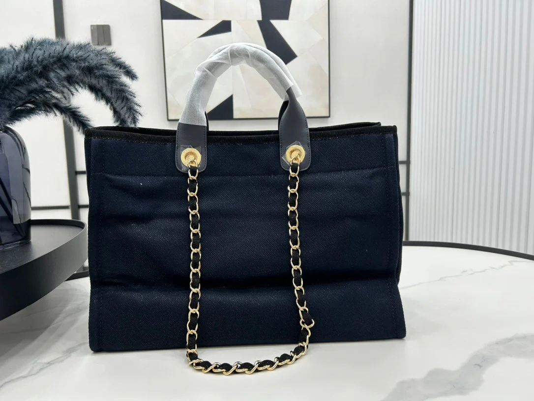 CHANEL DEAUVILLE LARGE 38 TOTE BAG IN BLACK CANVAS WITH GOLD EMBROIDERED LOGO
