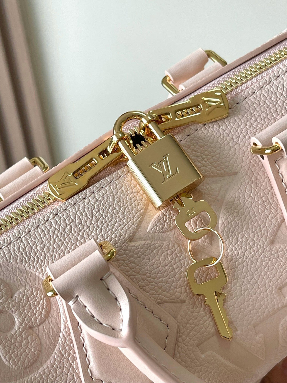 SPEEDY BANDOULIÈRE 20 IN LIGHT PINK MONOGRAM EMPREINTE LEATHER