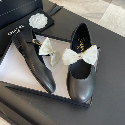 BALLET FLAT BLACK LAMBSKIN WITH WHITE BOW
