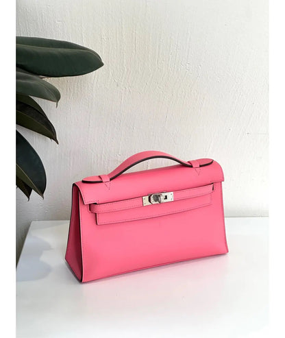 HERMES Kelly Pochette in swift leather Rose Azalee