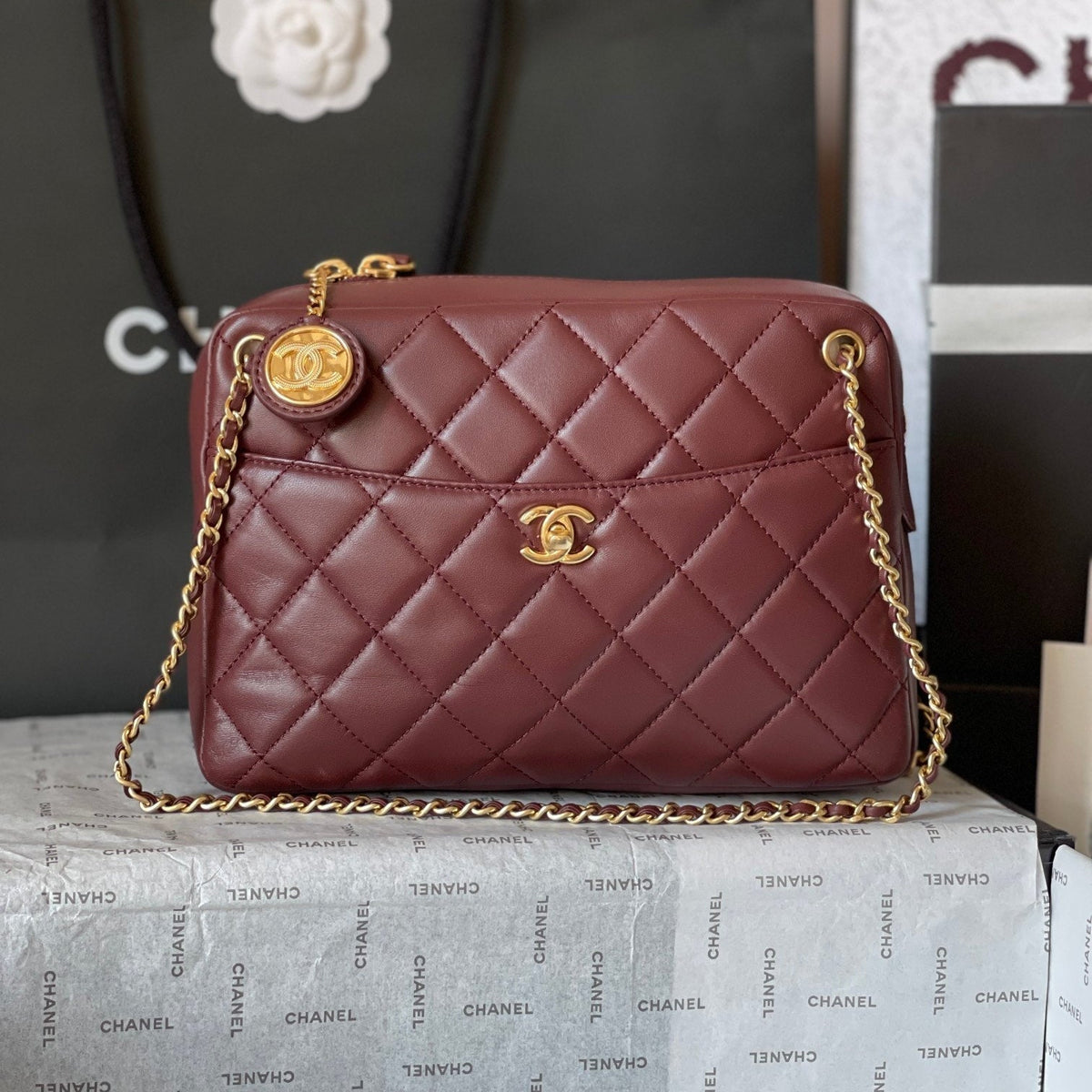 CAMERA BAG 24 IN BUCCANEER RED QUILTED LAMBSKIN DOUBLE C GOLD COIN