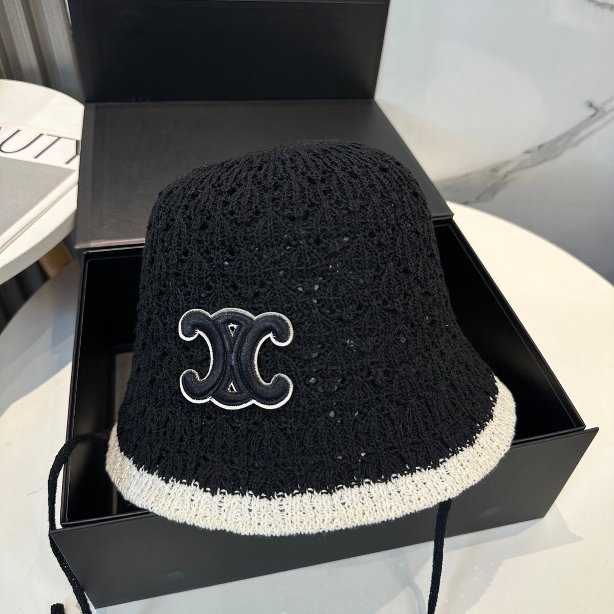 BUCKET HAT MODEL 652271 IN BLACK AND WHITE CROCHET