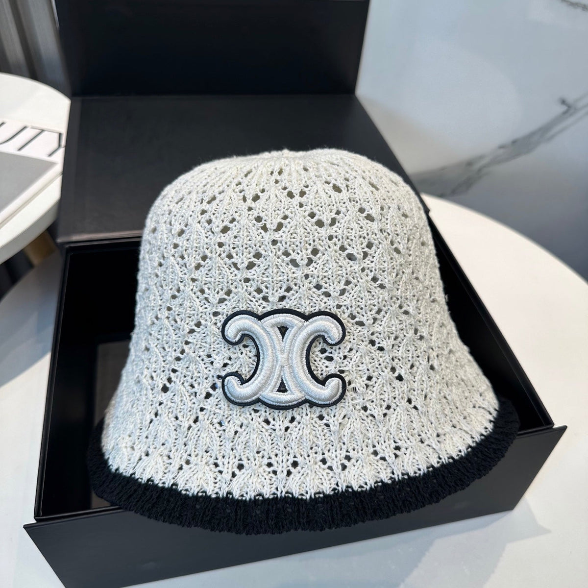 BUCKET HAT MODEL 652272 IN BLACK AND WHITE CROCHET