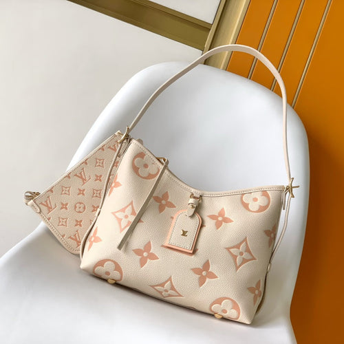 CARRYALL PM 29 BAG IN BEIGE MIX PINK MONOGRAM EMPREINTE LEATHER