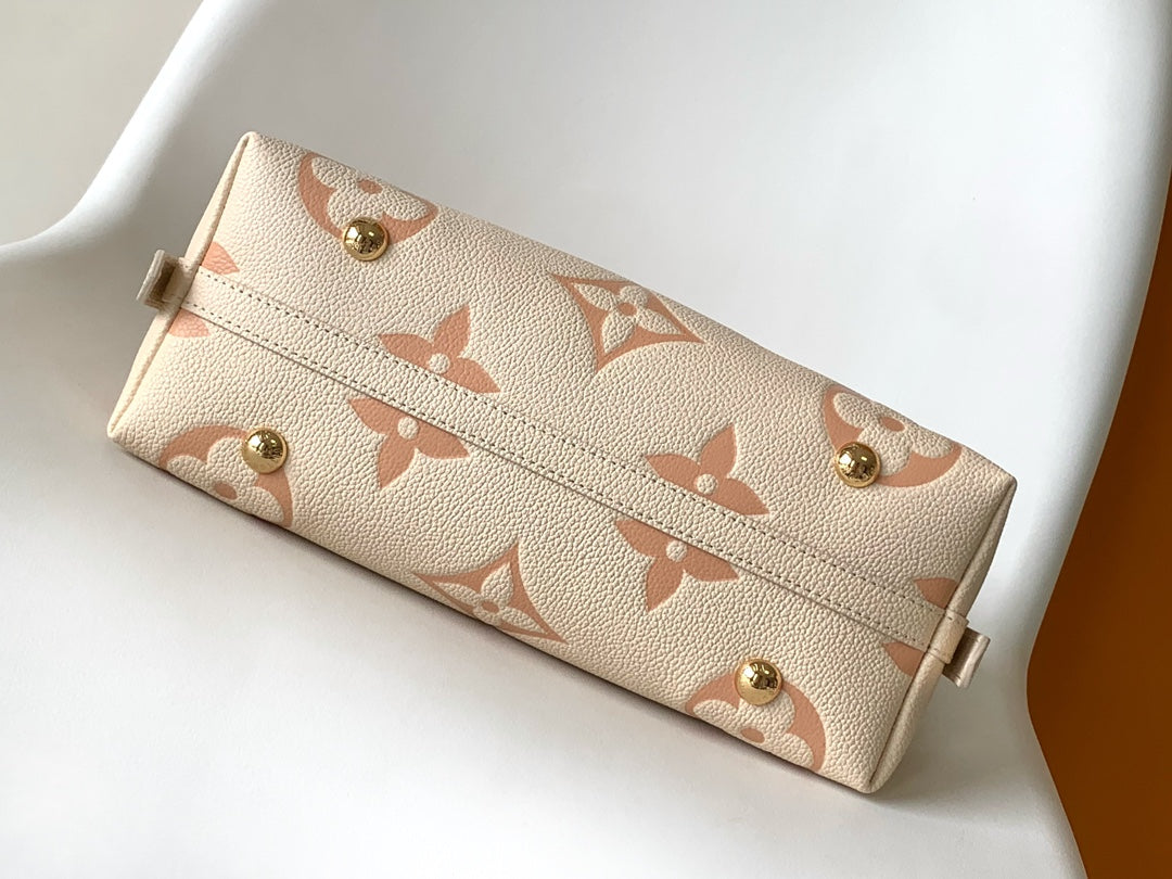 CARRYALL PM 29 BAG IN BEIGE MIX PINK MONOGRAM EMPREINTE LEATHER