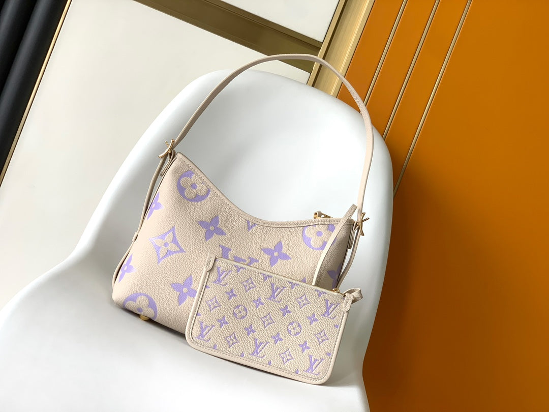CARRYALL PM 29 BAG IN BEIGE MIX PURPLE MONOGRAM EMPREINTE LEATHER