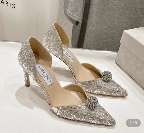 Jimmy Choo silver suede D’Orsay pumps