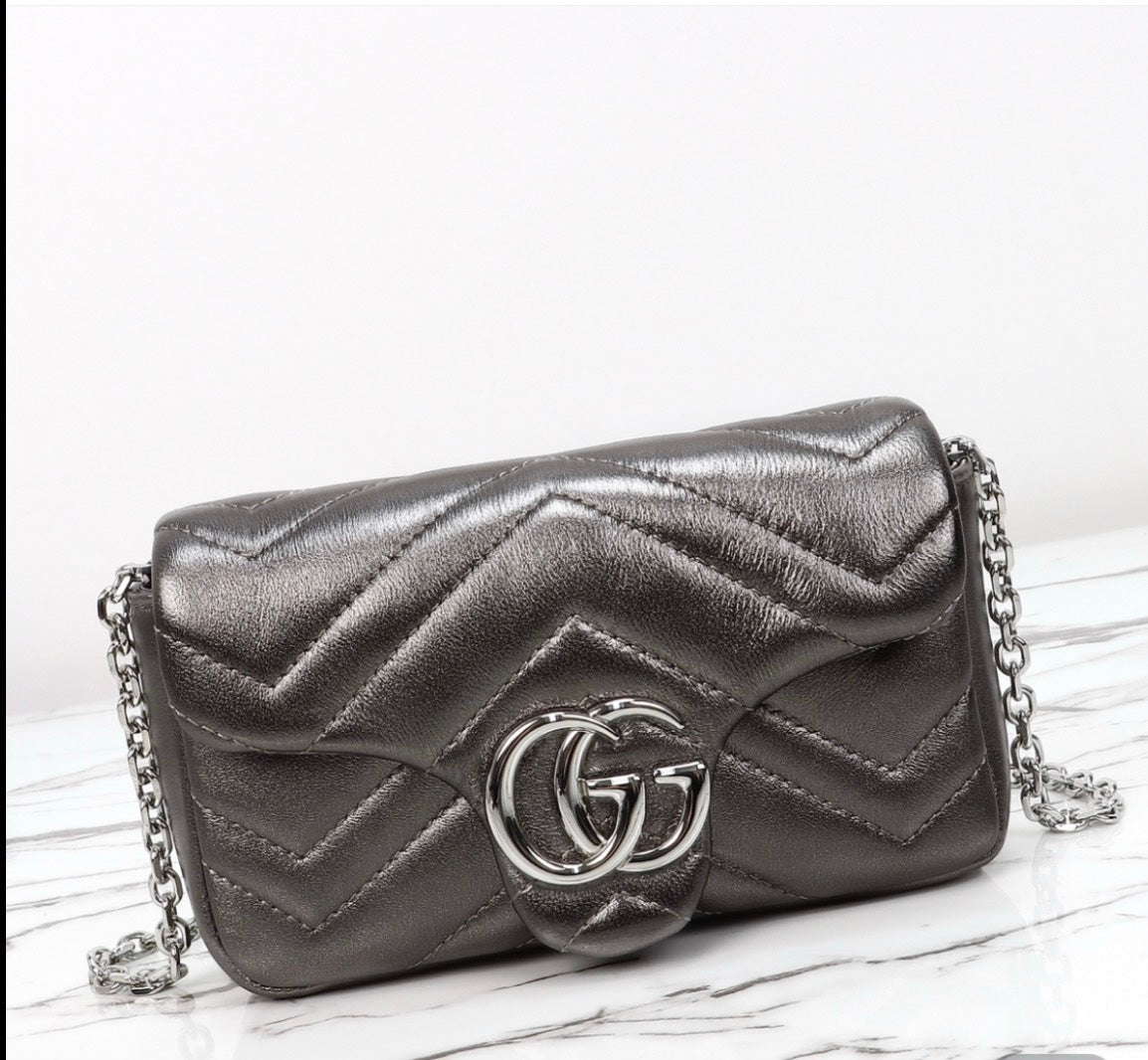 Gucci GG Marmont Mini metallic leather shoulder bag.