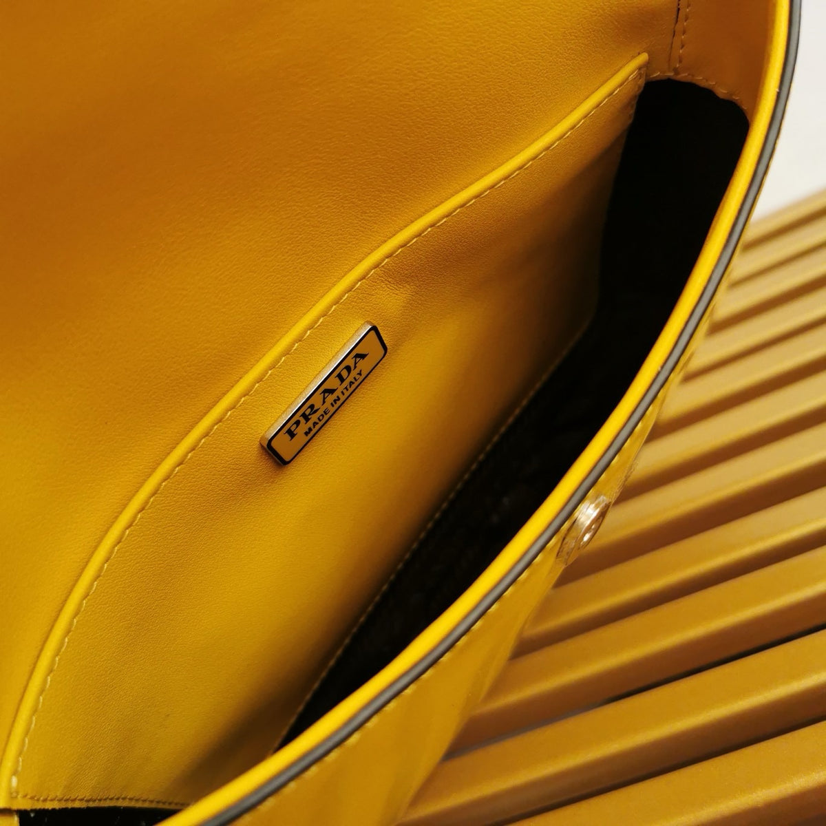 PRADA SPAZZOLATO CLEO SHOULDER BAG IN YELLOW