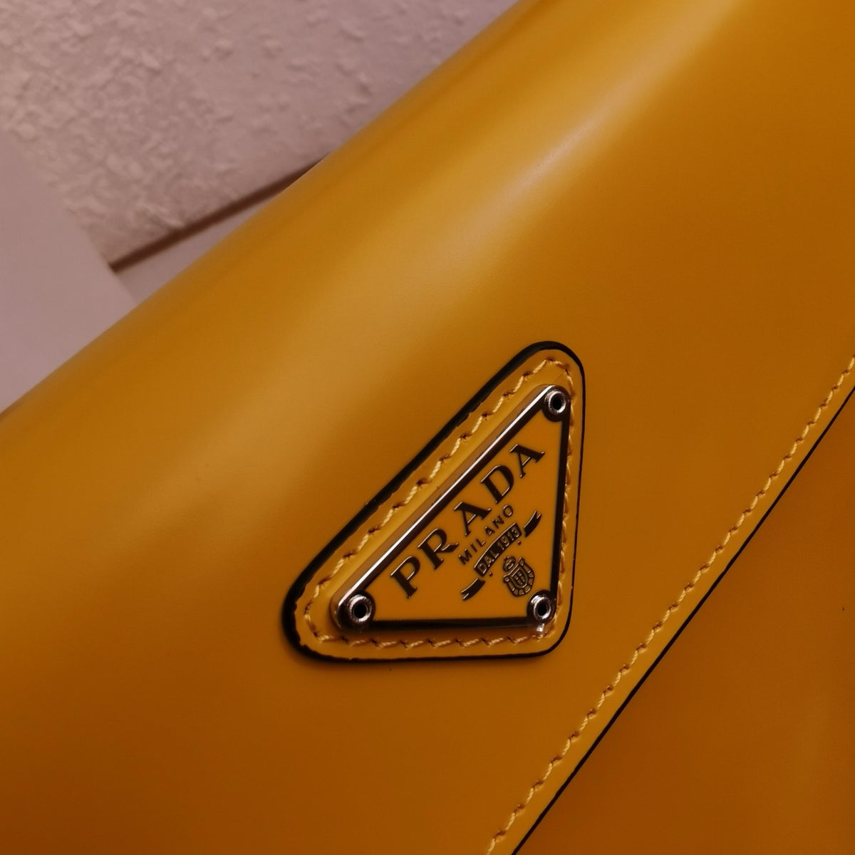 PRADA SPAZZOLATO CLEO SHOULDER BAG IN YELLOW