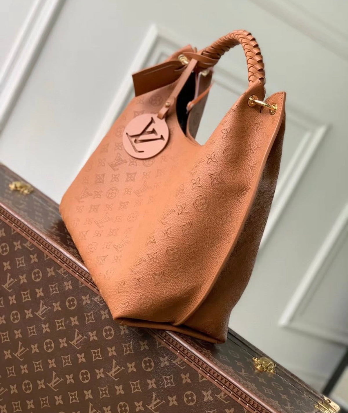 Louis Vuitton Carmel Mahina Leather Hobo Bag in Cognac