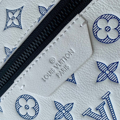 DISCOVERY PM BACKPACK 38 IN WHITE MONOGRAM LAMBSKIN