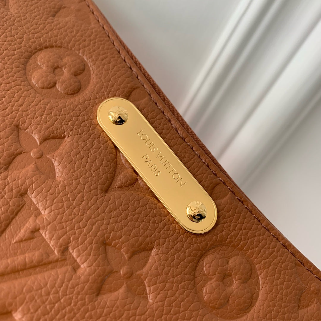 LIV POCHETTE BAG 24 IN COGNAC BROWN MONOGRAM EMPREINTE LEATHER