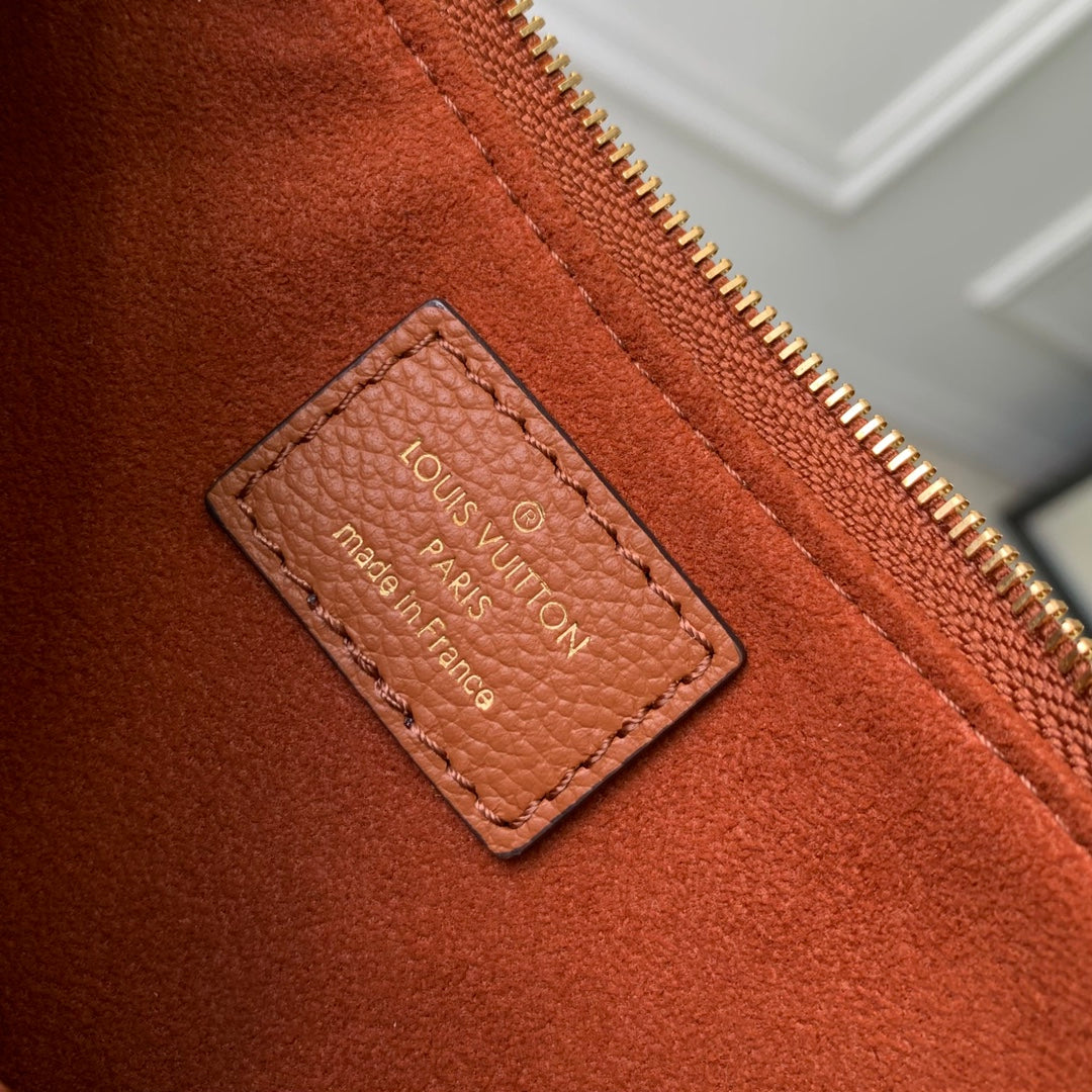 LIV POCHETTE BAG 24 IN COGNAC BROWN MONOGRAM EMPREINTE LEATHER