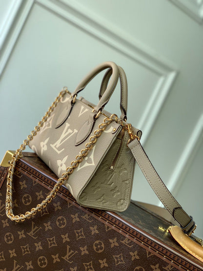 ONTHEGO EAST WEST BAG 25 IN GREEN MONOGRAM EMBOSSED COWHIDE