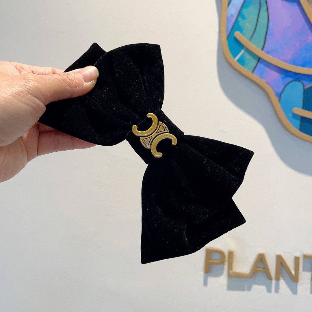 BLACK VELVET WITH GOLD LOGO HAIRPIN 387059