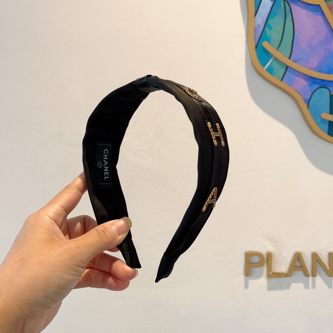 BLACK SILK HAIRBAND WITH GOLD LOGO 412441