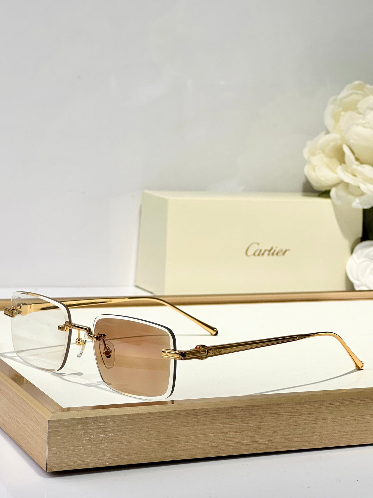C DE RIMLESS SQUARE FRAME SUNGLASSES CT0610S IN METAL