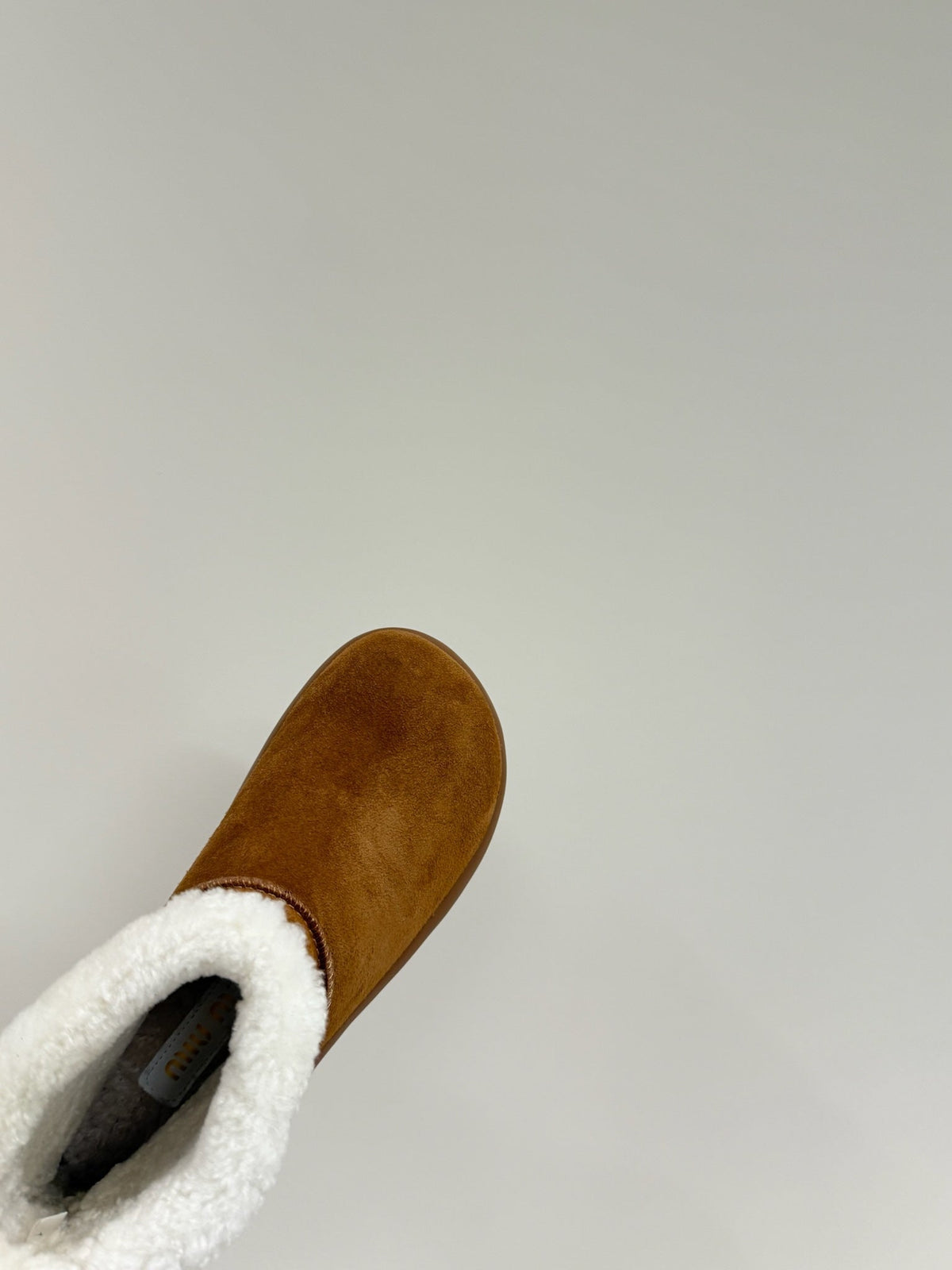 ANKLE BOOTS IN BRONZE BROWN SUEDE AND FLEECE LINING