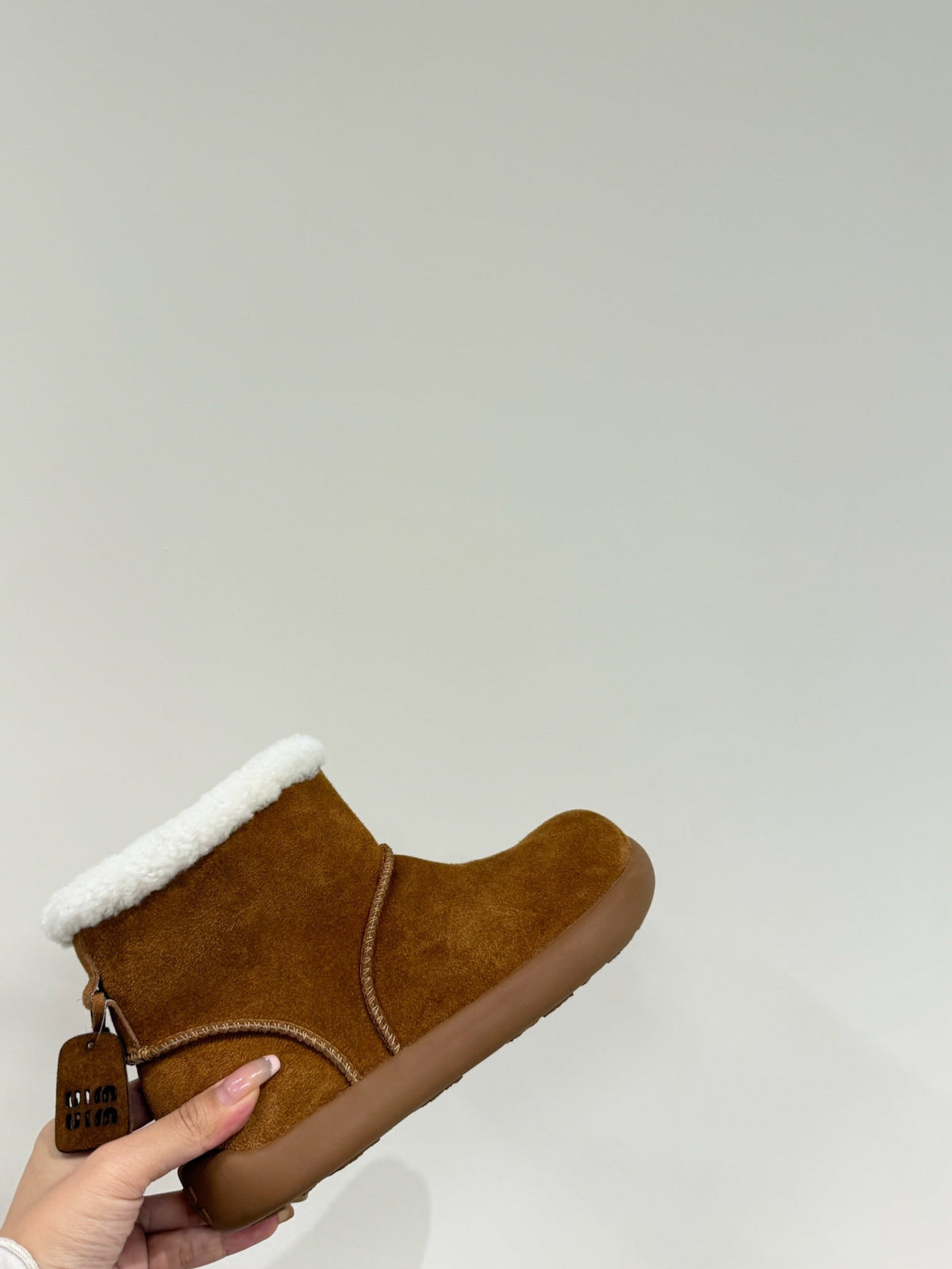 ANKLE BOOTS IN BRONZE BROWN SUEDE AND FLEECE LINING
