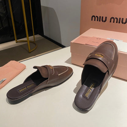 MULES SLIPPERS CHOCOLATE COLOR COWHIDE WITH GOLD COIN