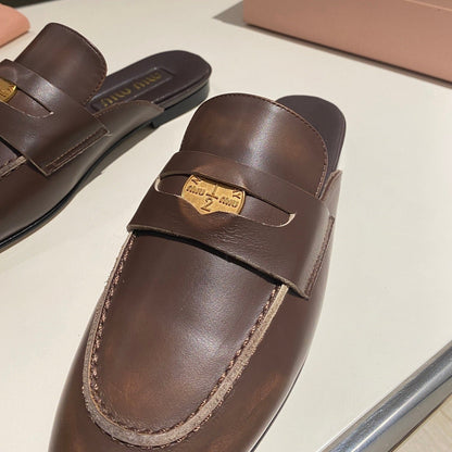 MULES SLIPPERS CHOCOLATE COLOR COWHIDE WITH GOLD COIN