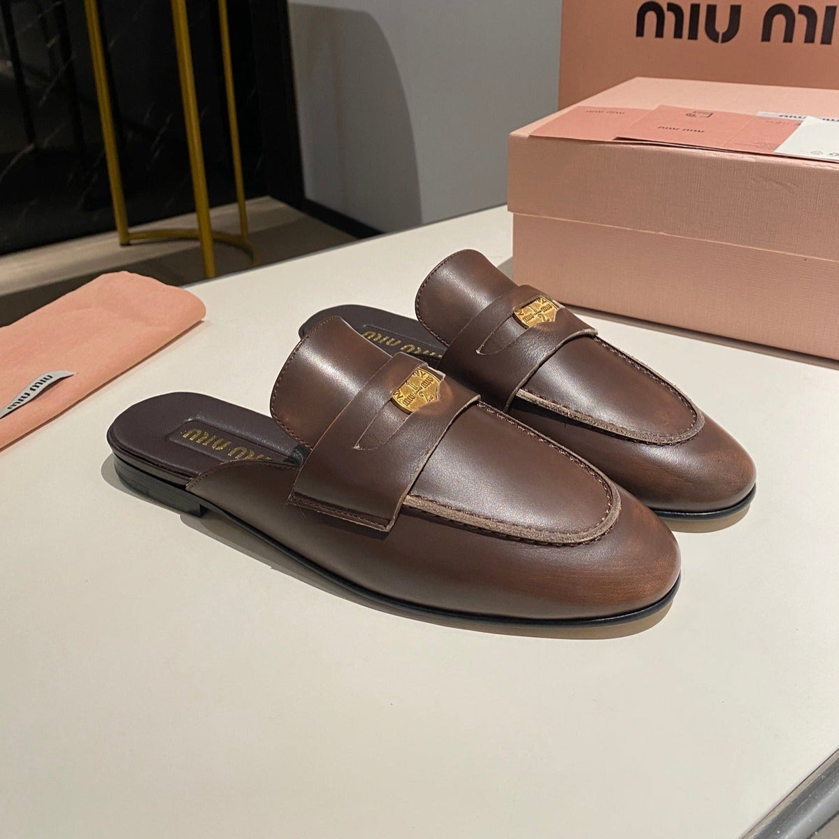 MULES SLIPPERS CHOCOLATE COLOR COWHIDE WITH GOLD COIN
