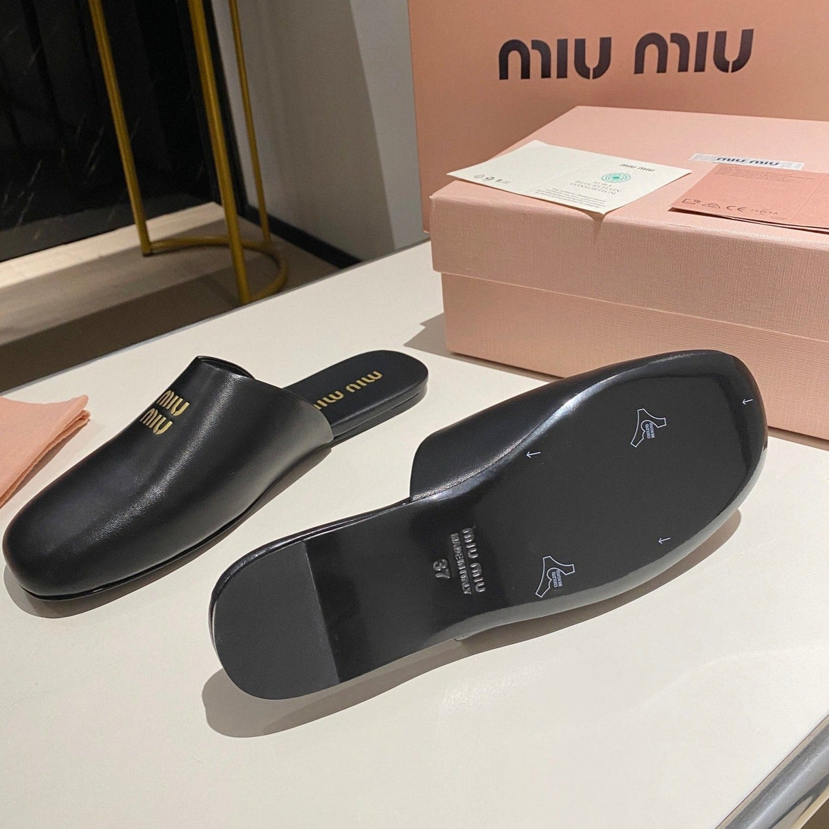 MULES SLIPPERS RETRO BLACK COWHIDE