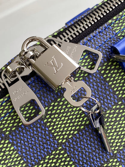 KEEPALL BANDOULIÈRE 50 IN BLUE GREEN DAMIER HERITAGE COATED CANVAS