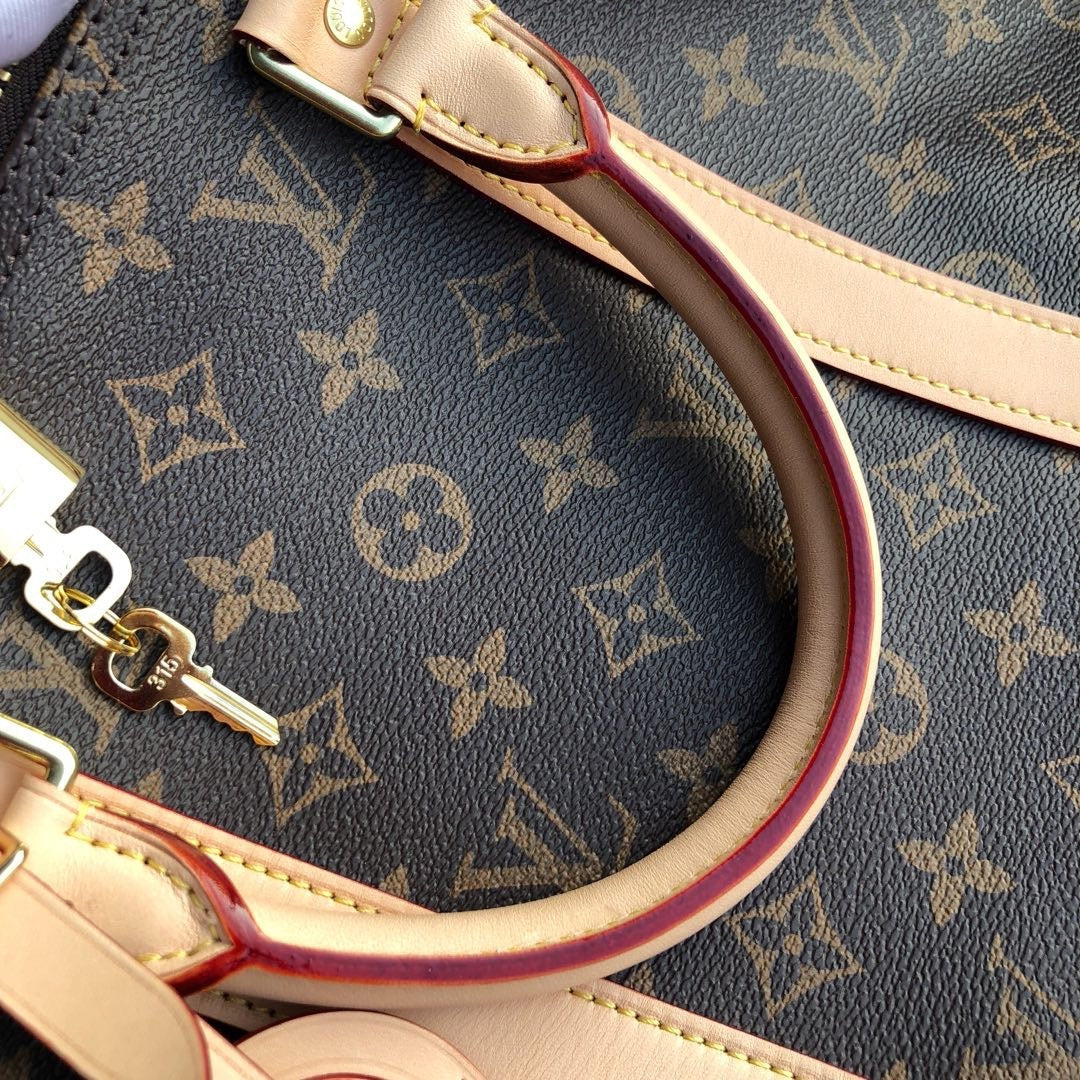 LV Monogram Canvas Keepall Bandoulière 55 Leather Duffle Bag