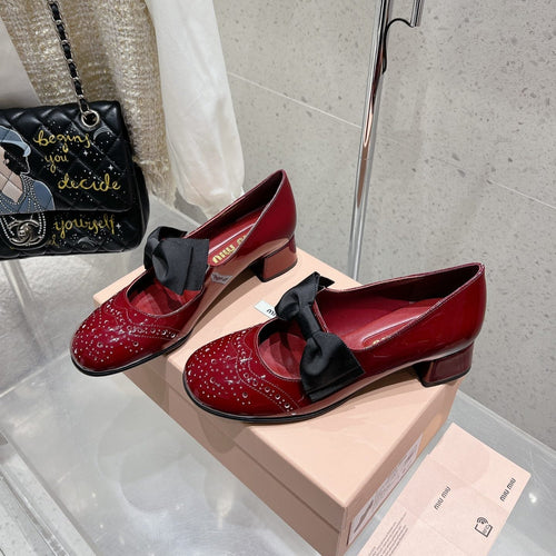 MARY JANE MID HEEL PUMPS IN RUBY RED PATENT LAMBSKIN WITH BOW