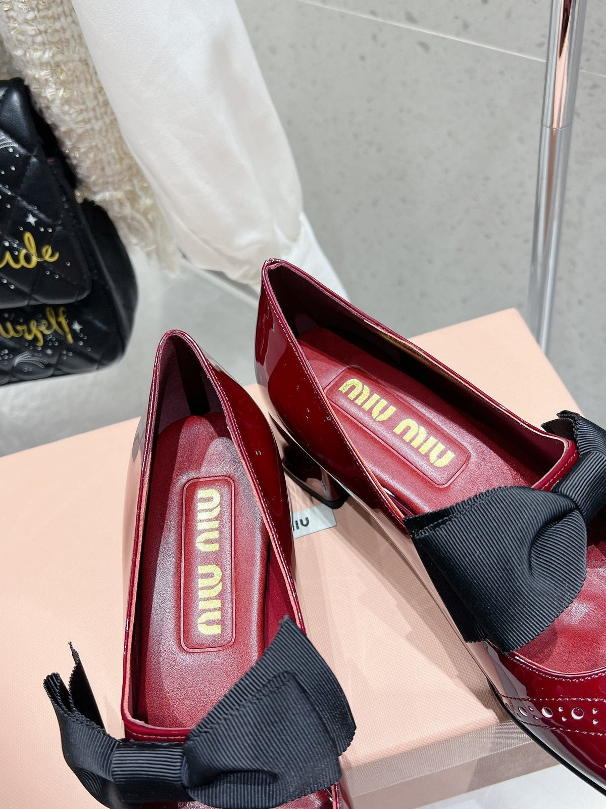 MARY JANE MID HEEL PUMPS IN RUBY RED PATENT LAMBSKIN WITH BOW