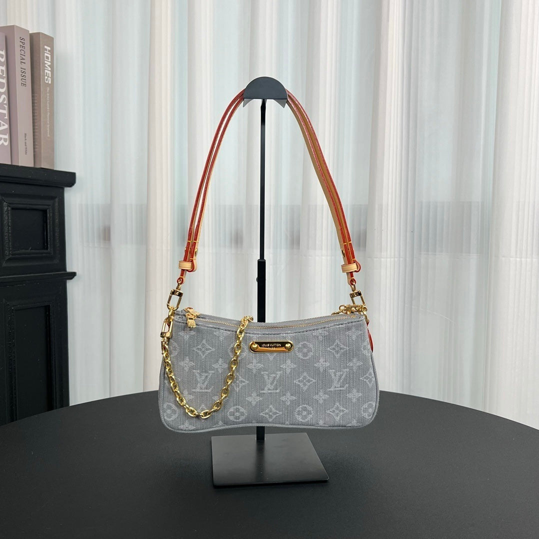 Louis Vuitton Liv Pochette in Washed Denim