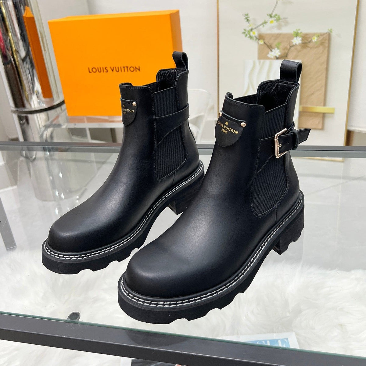 LV WOMEN'S SHORT BOOTS IN BLACK CALFSKIN