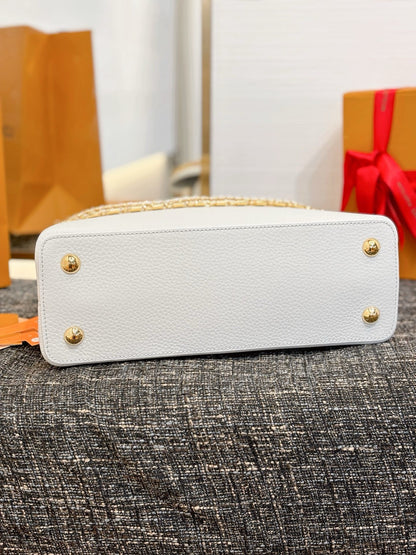 Louis Vuitton Capucines BB handbag in white Taurillon leather