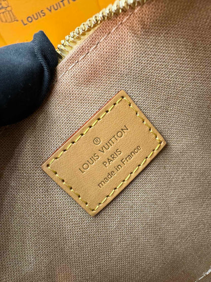 Louis Vuitton Nano Alma handbag in Monogram Dune canvas