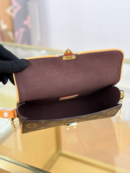 Louis Vuitton Monogram Pochette Camille in monogram canvas