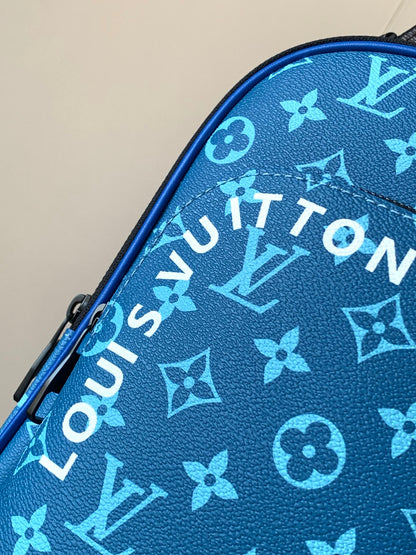 LV AVENUE SLINGBAG 31 IN BLUE AND BROWN TAIGA LEATHER