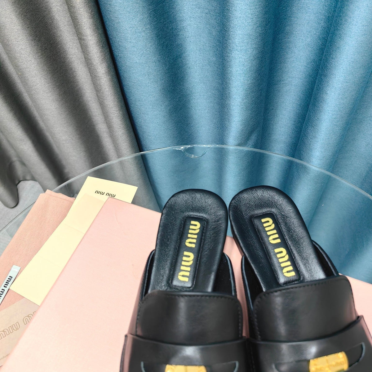 MULES SLIPPERS BLACK COWHIDE WITH GOLD COIN