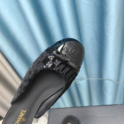 MULE IN BLACK SATIN AND LAMBSKIN